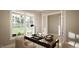 Spacious home office with large windows and built in shelving at 5628 Bella Terra Ct, Wake Forest, NC 27587