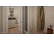 Convenient powder room with built-in bench and storage at 5628 Bella Terra Ct, Wake Forest, NC 27587