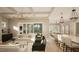 Open concept living room, kitchen, and dining area with hardwood floors at 5628 Bella Terra Ct, Wake Forest, NC 27587