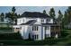 Stunning two-story home with a side view of the attached garage at 5628 Bella Terra Ct, Wake Forest, NC 27587