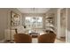 Bright living room with comfortable seating and large windows at 5628 Bella Terra Ct, Wake Forest, NC 27587