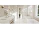 Luxurious bathroom with double vanity, soaking tubs, and walk-in shower at 5628 Bella Terra Ct, Wake Forest, NC 27587