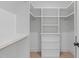 Large walk-in closet with ample shelving and hanging space at 600 Rocky Knob Ct, Raleigh, NC 27601