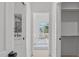 Bright hallway with access to bedroom, bathroom, and closet at 600 Rocky Knob Ct, Raleigh, NC 27601
