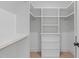 Spacious walk-in closet with shelving and drawers at 602 Rocky Knob Ct, Raleigh, NC 27601