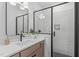Modern bathroom with white subway tile and a walk-in shower at 602 Rocky Knob Ct, Raleigh, NC 27601