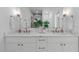 Double vanity with quartz countertop and brushed gold fixtures at 602 Rocky Knob Ct, Raleigh, NC 27601