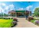 Park carousel with vibrant colors, surrounded by landscaping and walkways at 614 Rocky Knob Ct, Raleigh, NC 27601