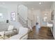Spacious entryway with hardwood floors and a staircase at 8820 Melvin St # 16, Willow Springs, NC 27592