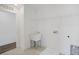 Convenient laundry room with a utility sink and ample shelving at 8820 Melvin St # 16, Willow Springs, NC 27592