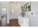 Welcoming entry with hardwood floors and white console table at 8820 Melvin St # 16, Willow Springs, NC 27592
