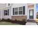 Craftsman style home with gray siding, brick accents, and a welcoming front porch at 795 Washington St, Fuquay Varina, NC 27526