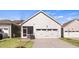 Attached garage with screened porch and ample parking space at 795 Washington St, Fuquay Varina, NC 27526