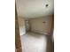 Unfinished bedroom with closet and large window at 2638 Davis St, Raleigh, NC 27608