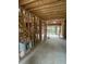 Under construction home with exposed framing and unfinished rooms at 2638 Davis St, Raleigh, NC 27608