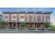 Modern townhome exteriors with brick and metal accents at 779 Willard St, Durham, NC 27701