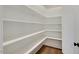 Bright and spacious pantry with numerous shelves for food storage at Lot 4 Harding St, Efland, NC 27243