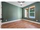 Bright office with two windows and dark green accent wall at Lot 4 Harding St, Efland, NC 27243