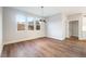 Spacious dining area with hardwood floors and stylish light fixture at Lot 4 Harding St, Efland, NC 27243