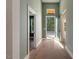Light-filled entryway with hardwood floors and access to multiple rooms at Lot 4 Harding St, Efland, NC 27243