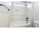 Clean bathroom with white subway tile, a shower/tub combo, and a window at Lot 4 Harding St, Efland, NC 27243