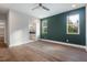 Spacious bedroom with two windows, a ceiling fan and access to a walk-in closet and bathroom at Lot 4 Harding St, Efland, NC 27243