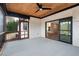 Relaxing screened porch with concrete flooring and access to the backyard at Lot 4 Harding St, Efland, NC 27243