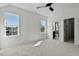 Bedroom with carpet, ceiling fan, and en-suite bathroom at 55 Harvest View Way, Franklinton, NC 27525