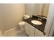 Bathroom with granite countertop and updated fixtures at 4622 Jacquline Ln, Raleigh, NC 27616