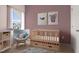 Charming Bedroom with crib and soothing decor at 264 Bruce Dr, Dunn, NC 28334