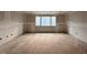 Large bedroom with window and wood flooring at 5208 Knollwood Rd, Raleigh, NC 27609