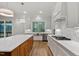 Kitchen features stainless steel appliances and white cabinetry at 60 Harvest View Way, Franklinton, NC 27525