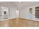 Large main bedroom with hardwood floors and access to private bath and deck at 60 Harvest View Way, Franklinton, NC 27525