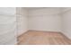 Spacious walk-in closet with wire shelving at 180 Harpeth Dr, Franklinton, NC 27525