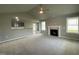 Living room with a fireplace and high ceilings at 46 Scotties Ridge Dr, Princeton, NC 27569