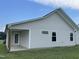 Exterior view of house with vinyl siding and a covered patio at 46 Scotties Ridge Dr, Princeton, NC 27569