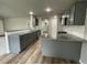 Modern kitchen with granite countertops and gray cabinets at 46 Scotties Ridge Dr, Princeton, NC 27569