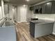 Modern kitchen with gray cabinets and granite countertops at 46 Scotties Ridge Dr, Princeton, NC 27569