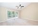 Spacious bedroom with large window and carpet at 106 Paladin Pl, Cary, NC 27513