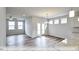 Bright dining room with hardwood floors and access to back patio at 1677 Abberly Pl, Graham, NC 27253