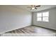 Bright bedroom with hardwood floors and large window at 1677 Abberly Pl, Graham, NC 27253