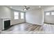 Spacious living room with hardwood floors and fireplace at 1677 Abberly Pl, Graham, NC 27253