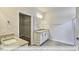 Modern bathroom with granite countertops and a walk-in shower at 1677 Abberly Pl, Graham, NC 27253