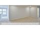 Large bonus room with carpeted floors and multiple windows at 1677 Abberly Pl, Graham, NC 27253