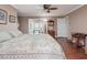 Main bedroom with a king-size bed and access to the bathroom at 557 Olives Chapel Rd, Apex, NC 27502