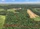 Aerial view of property with marked boundaries at 557 Olives Chapel Rd, Apex, NC 27502
