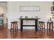 Small breakfast nook with table and two chairs at 557 Olives Chapel Rd, Apex, NC 27502
