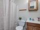 Clean bathroom with shower/tub and wood vanity at 557 Olives Chapel Rd, Apex, NC 27502