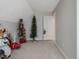 Bonus room with Christmas decorations and a door at 557 Olives Chapel Rd, Apex, NC 27502