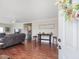Living room with hardwood floors and entryway view at 557 Olives Chapel Rd, Apex, NC 27502